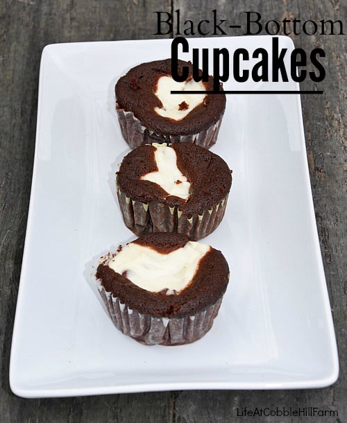 Black-Bottom Cupcakes are chocolate cupcakes with a delicious sour cream/cream cheese center