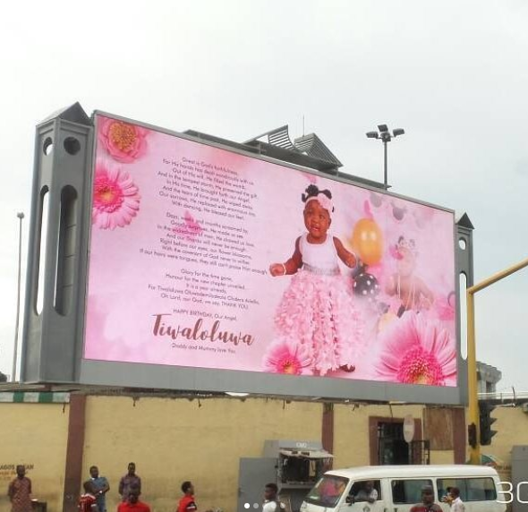 Lucky girl! Comedian Seyilaw gets a billboard in Lagos to celebrate daughter