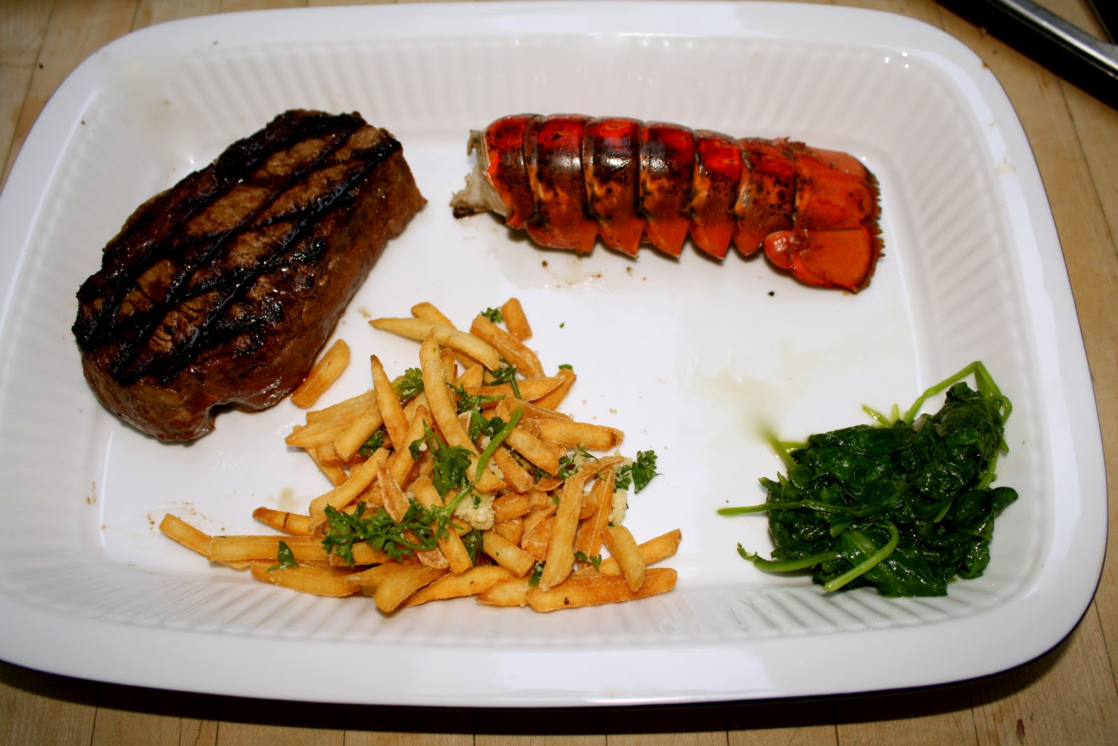 An Immovable Feast New York Steak & Lobster with ChampagneVanilla Sauce