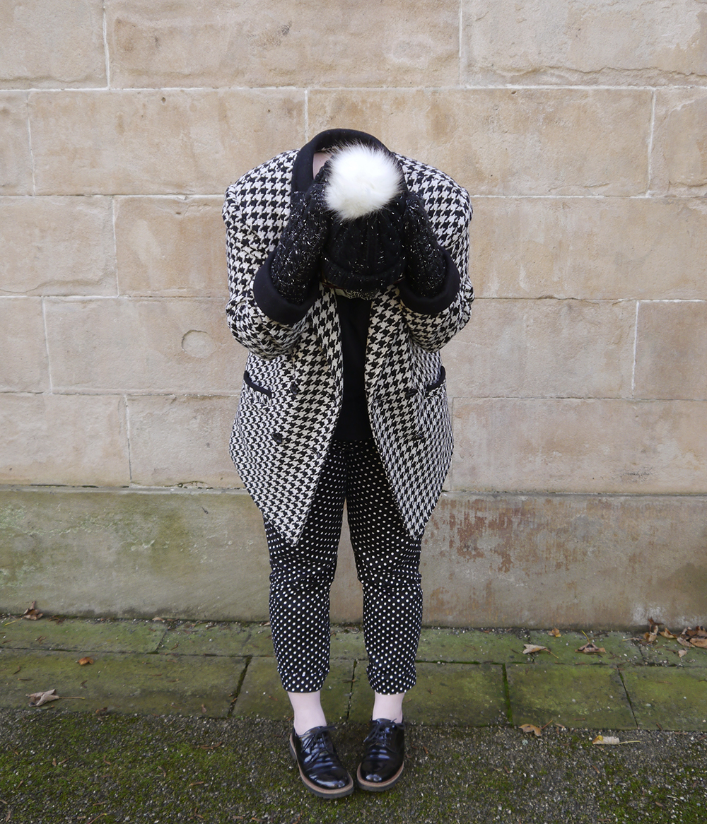 Winter woolies - pom pom hat Styled by Helen, Scottish blogger, Wardrobe Conversations, Dundee blogger, winter outfit, winter style, dressing for winter, monochrome outfit, monochrome street style, winter accessories, Tiger, charity shop find, clashing patterns, black and white outfit, pom pom hat