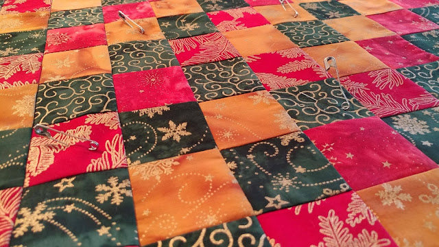 Metallic batiks quilted table topper