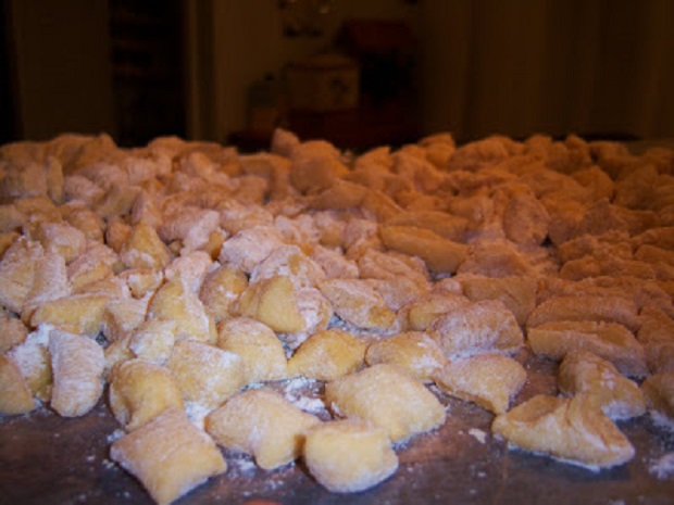 this is how to make Italian Struffoli and the pieces are cut in 3/4 inch pieces and getting ready to be fried