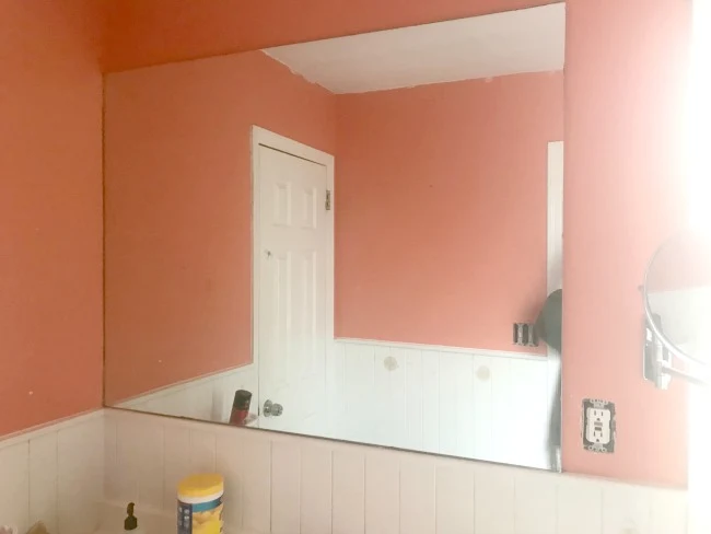 Orange bathroom and mirror