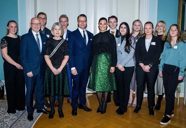 Crown Princess Victoria wore a metallic brocade skirt by Baum und Pferdgarten, and a black silk blouse by Rodebjer