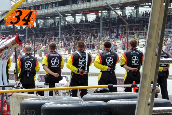 Crew of Michael Annett’s team, the #7 Pilot/Flying J Chevrolet, stand in formation during the race opening ceremonies. #crownheroes #jww400 #reignon #nascar