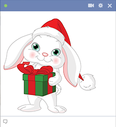 Christmas bunny sticker with a gift