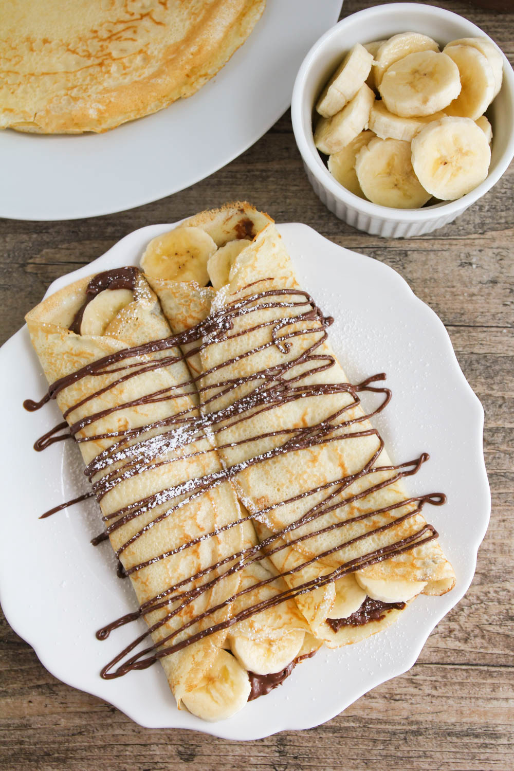 These nutella banana crepes are the perfect indulgent breakfast or dessert. Super easy to make and so delicious!