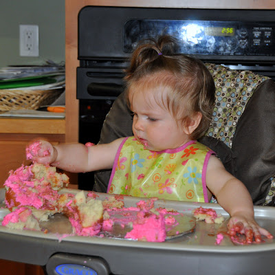 Birthday girl attacks pig cake