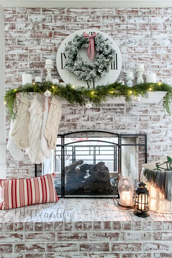 painted fireplace and neutral Christmas mantle