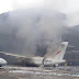 Photographs from the scene of the Overland flying machine that burst into flames at Lagos Airport