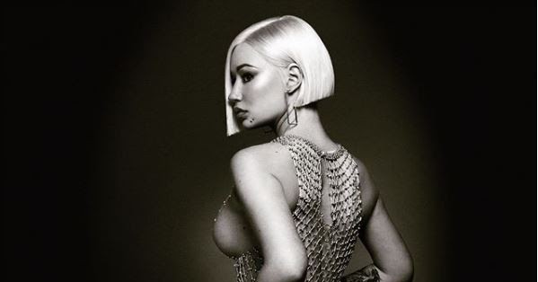 Iggy Azalea shares more nude photos of herself wearing only a beaded mesh d...