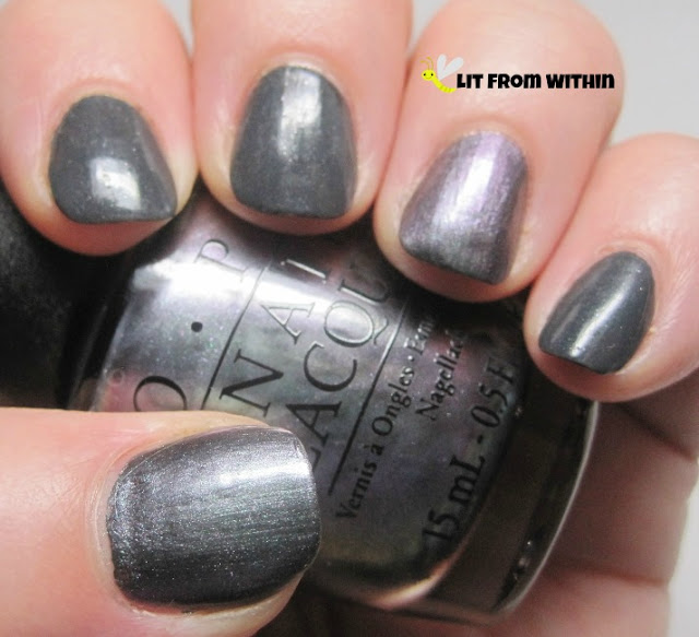 Essie Cashmere Bathrobe, a deep grey with silver shimmer and accent nails on my thumb and ring with OPI Peace, Love, and OPI, a grey/purple duochrome