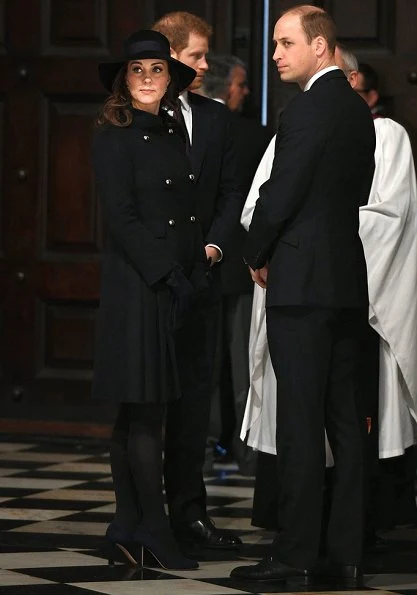 Duchess Catherine -Kate Middleton wore a double wool coat by Carolina Herrera. Jimmy Choo Georgia shoes.