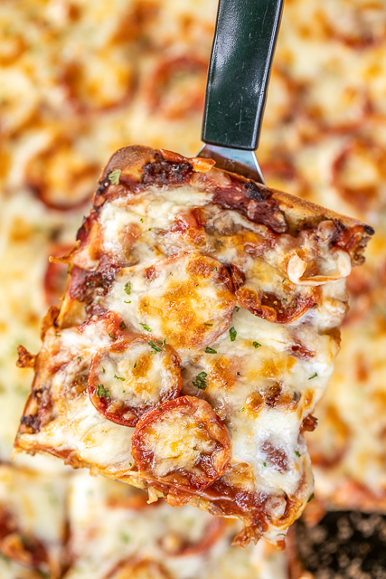 Crazy Crust Pizza - our new favorite pizza!! No rolling out dough - the crust is made from a liquid batter. Top the pizza with your favorite toppings. Flour, salt, Italian seasoning, eggs, milk, pepperoni, sausage, ham, pizza sauce and mozzarella cheese. We LOVE this pizza! We've been making it once a week for the past month. It is our go-to recipe!! #pizza #casserole Crazy Crust Pizza - our new favorite pizza!! No rolling out dough - the crust is made from a liquid batter. Top the pizza with your favorite toppings. Flour, salt, Italian seasoning, eggs, milk, pepperoni, sausage, ham, pizza sauce and mozzarella cheese. We LOVE this pizza! We've been making it once a week for the past month. It is our go-to recipe!! #pizza #casserole