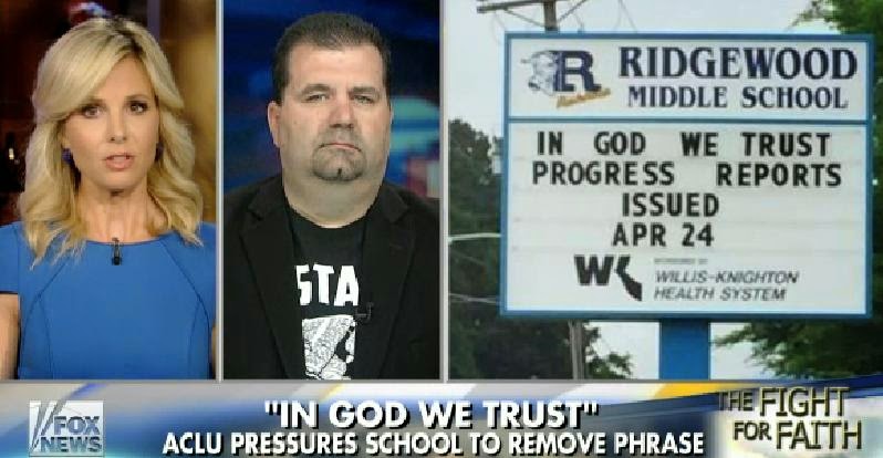 http://video.foxnews.com/v/4203683892001/students-stand-up-for-in-god-we-trust-on-school-marquee/?#sp=show-clips