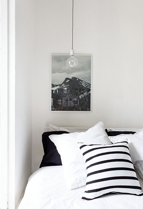 Bare bulb pendant lamps as bedside lighting | Image via Ollie and Seb's House