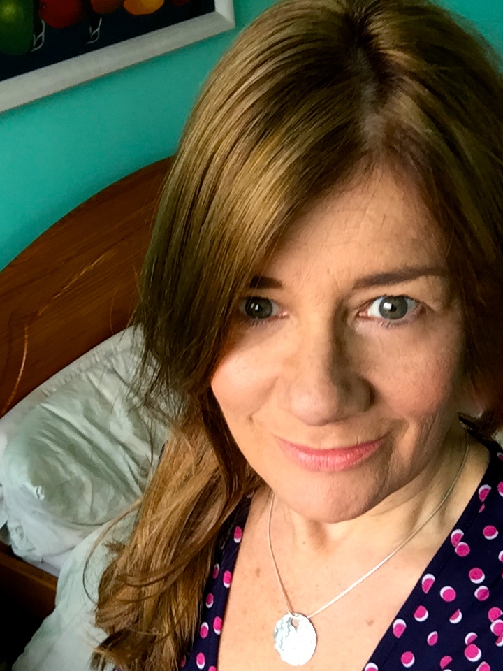 Photo of me wearing the Glitterball Disc Pendant from Nude Jewellery Contemporary Jewellery London