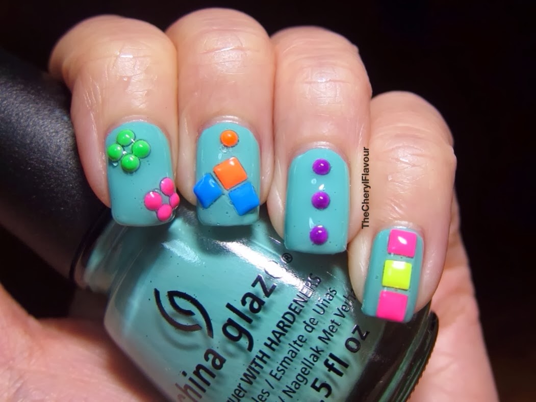 5. Multi-colored Nail Art Studs and Spikes - wide 2