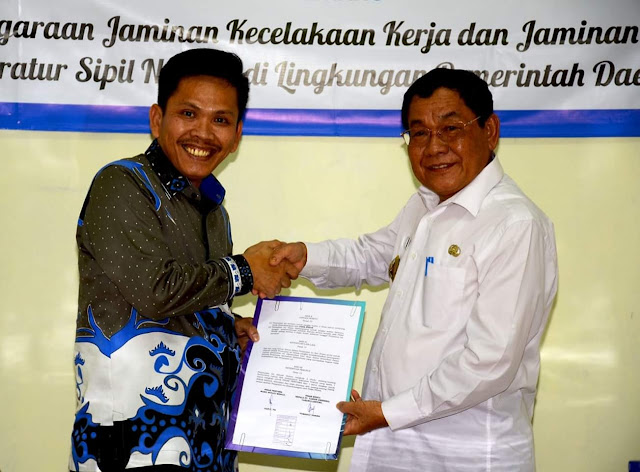 Kali Pertama di Lampung, Pemkab Mesuji Kerjsama PT Taspen Beri JKK-JKm Bagi Honorer