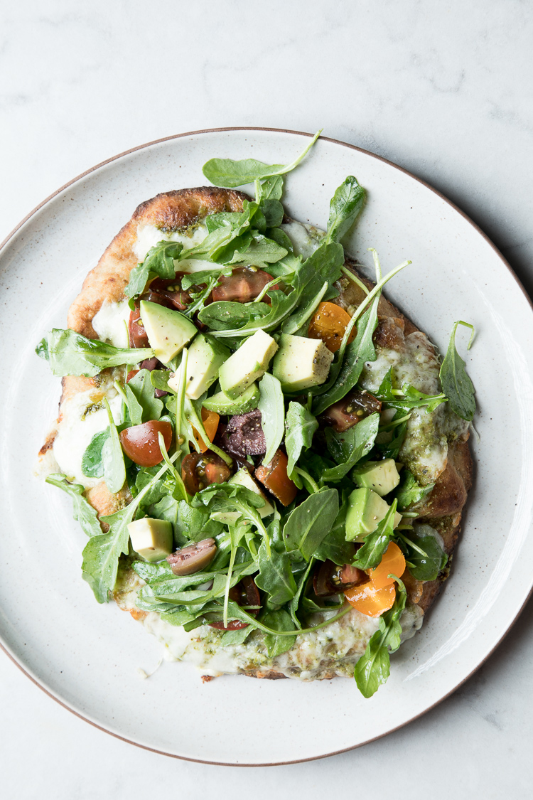 Grilled Flatbread with Mozzarella, Basil Pesto, Arugula, Tomatoes, and