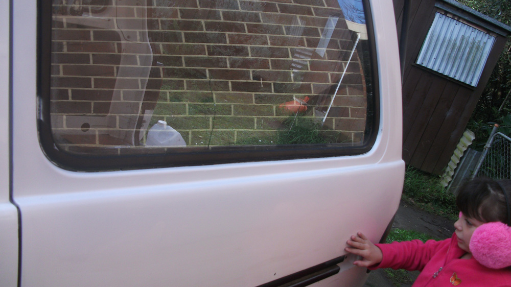 Gems Removing a Van window.