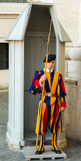 A soldier from the Swiss Guard on duty in the Vatican