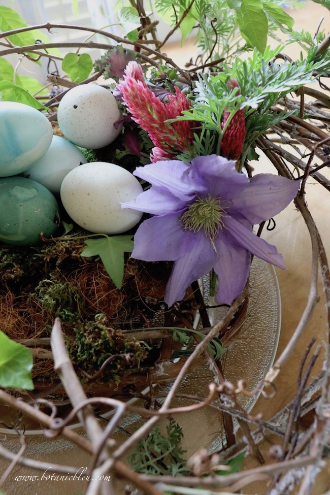 Spring celebration grapevine bird nest centerpiece with fresh flowers