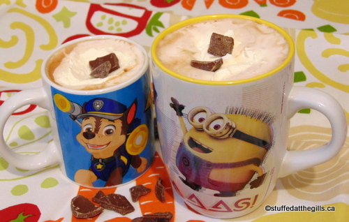 Mugs of hot chocolate made with extra chocolate chunks.  