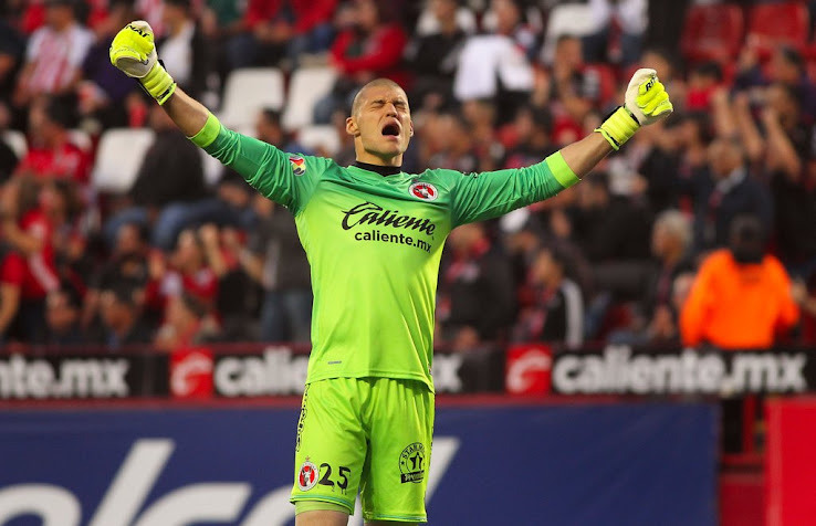 Insane Mexican Goalkeeper Wears Gloves Sponsored By Red Bull