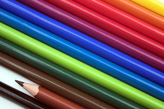 image of colored pencils in a row 