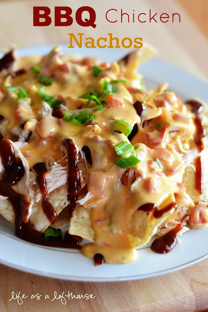 BBQ Chicken Nachos are tortilla chips covered in shredded chicken, BBQ sauce and nacho cheese. Life-in-the-Lofthouse.com