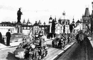 German motorcycle division crossing the Charles Bridge March 15, 1939