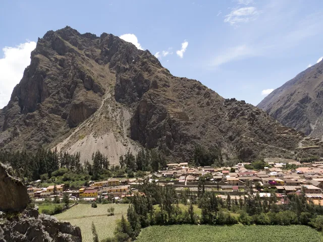 View of Ollantaytambo Peru with mountain backdrop