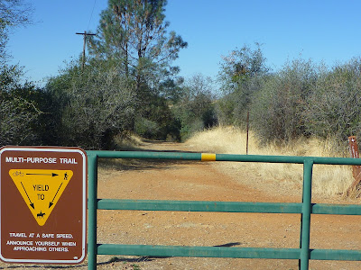 “Yield To” sign at Cave Valley gate near Northside School