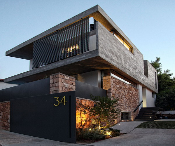 rumah minimalis tampak depan dengan batu alam