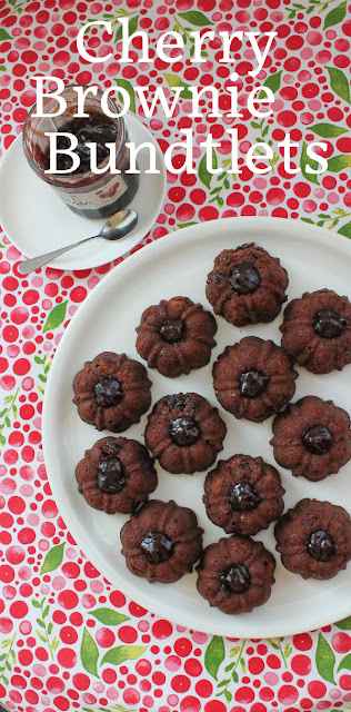 Food Lust People Love: These chewy cherry brownie bundtlets are as delicious as they are pretty, with a rich brown crumb, ribbons of cherry jam inside and little dollops of cherry jam on top. Best of all, they are super easy to make.