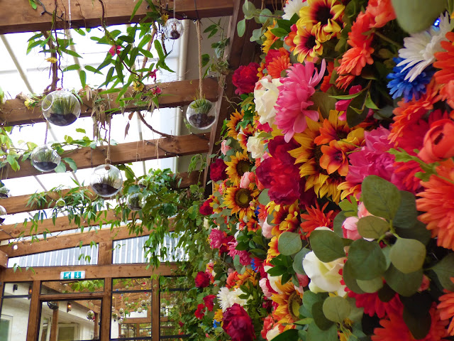 Flower wall at afternoon tea at Dominique Ansel Bakery, Belgravia, London