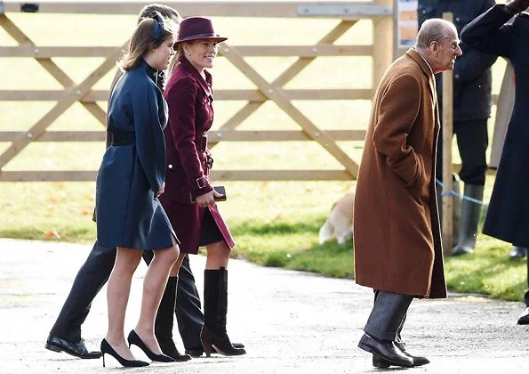 Queen Elizabeth, Countess Sophie of Wessex, Lady Louise Windsor, Princess Anne, Princess Eugenie. Princess Beatrice wore Burberry detachable rib knit collar cashmere coat