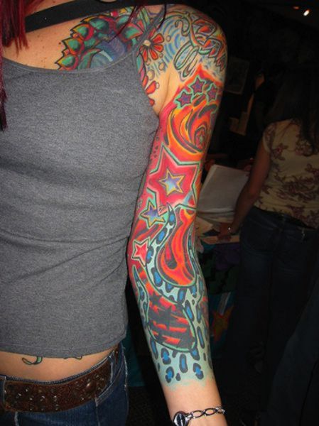 Cute Girls With Sleeve Tattoos - smile with picture
