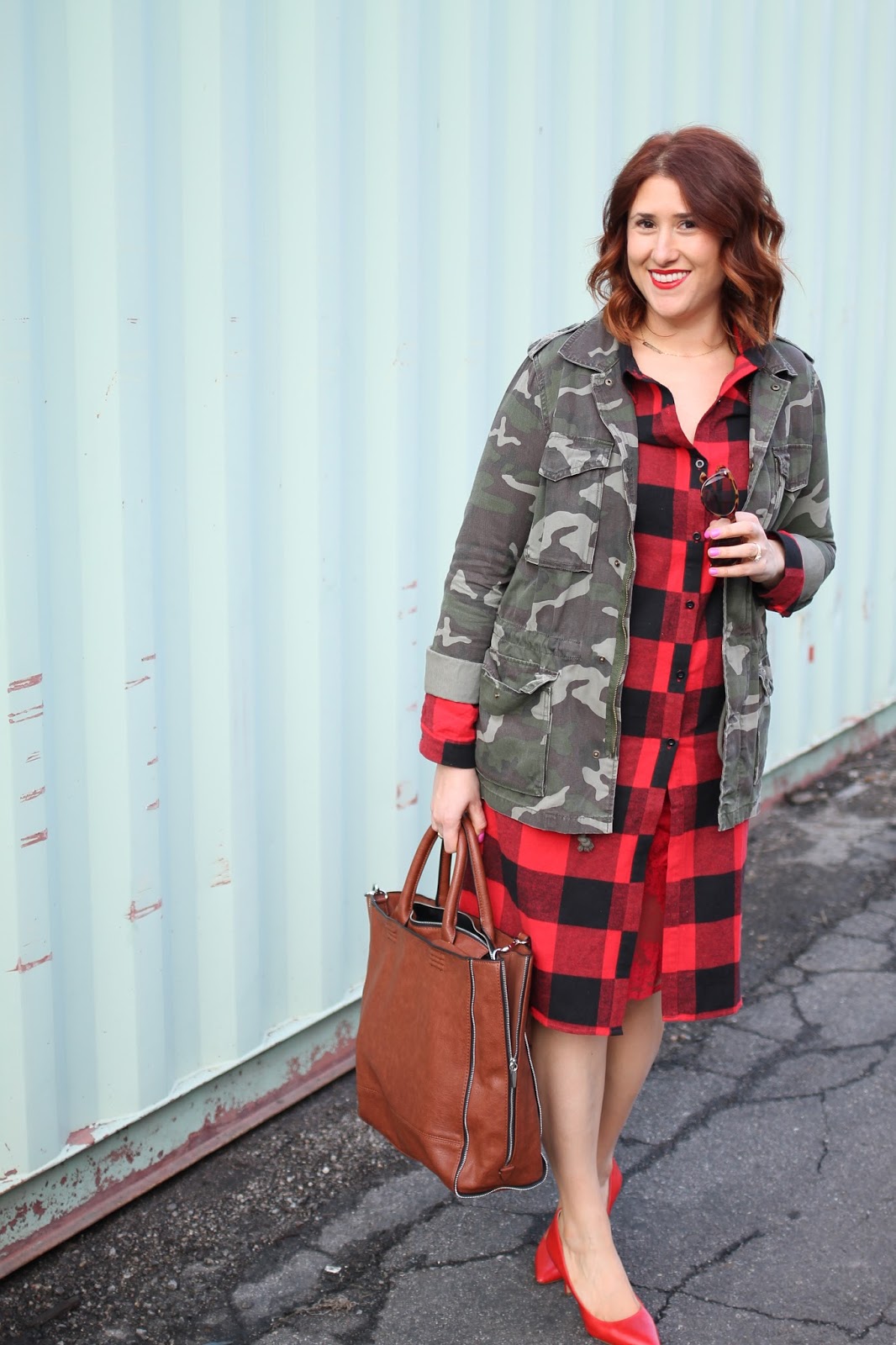 army camo surplus jacket, red lace slip, buffalo plaid check dress, curly red hair, red pumps