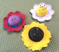 http://hopeandgloria.blogspot.co.uk/2016/08/flower-power-pin-cushions.html