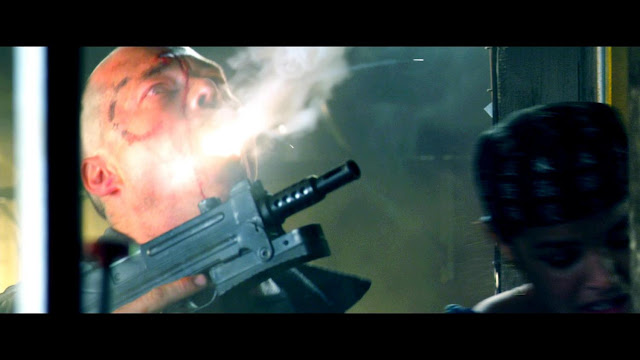 Dredd killing a perp with extreme violence