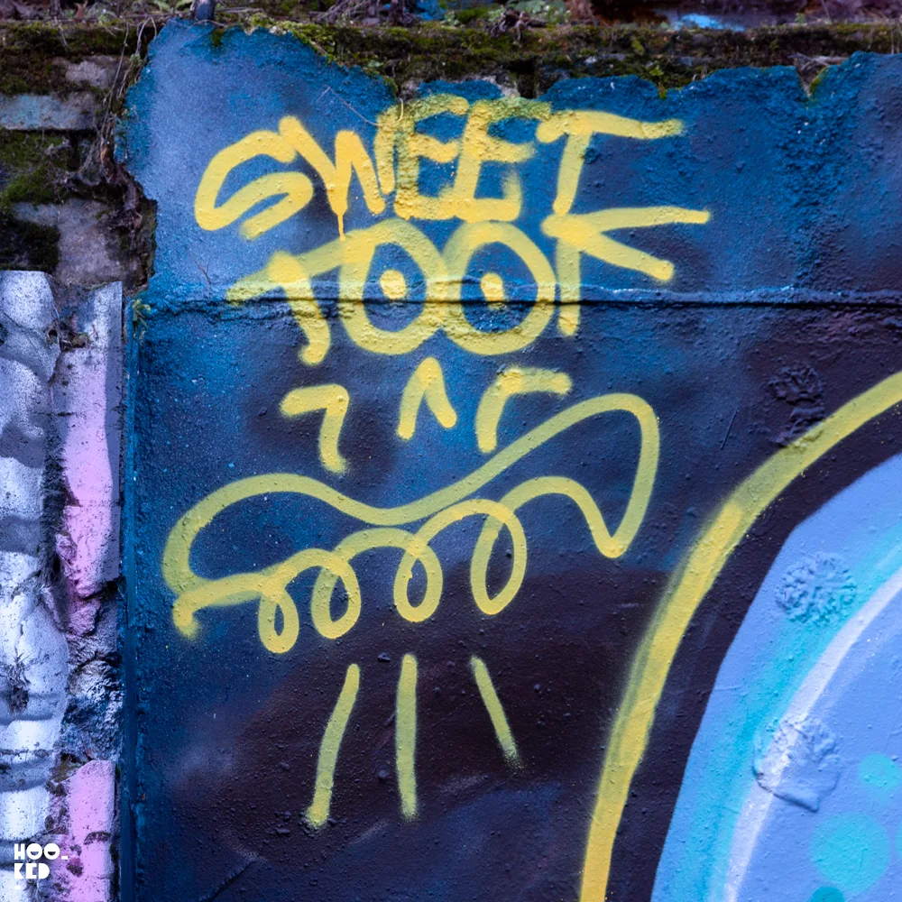 UK Street Artist Sweet Toof signature tag on the Seven Star Yard Wall