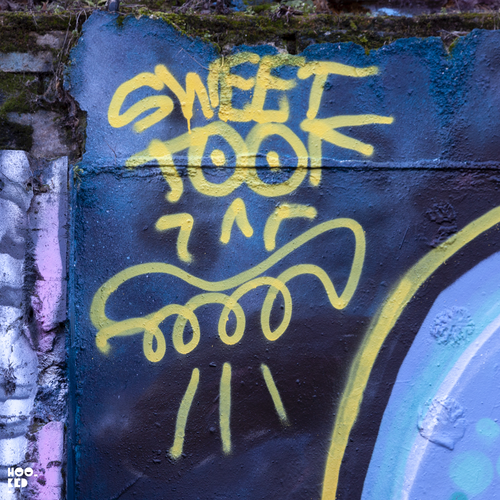 UK Street Artist Sweet Toof signature tag on the Seven Star Yard Wall UK Street Artist Sweet Toof signature tag on the Seven Star Yard Wall