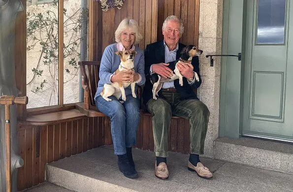 Prince Charles, Prince of Wales and the Duchess of Cornwall with Jack Russell terriers Bluebell and Beth
