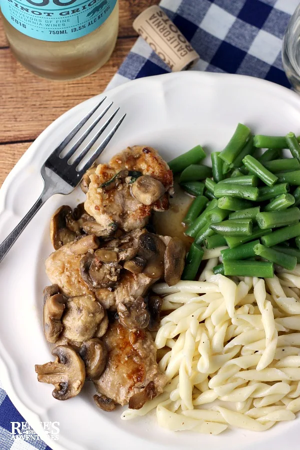 Easy Pork Tenderloin Marsala plated with wine