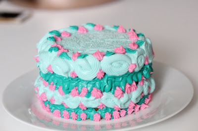 Colorful cake with decorative piping