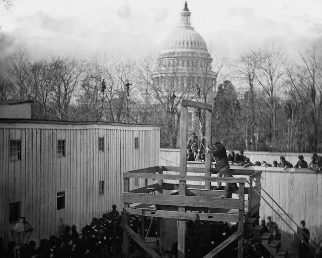 An execution in Washington, District of Columbia, on November 10, 1865. Henry Wirz, former commander of the Confederate prisoner of war camp near Andersonville, Georgia, was tried and hung after the war for conspiracy and murder related to his command of the notorious camp.