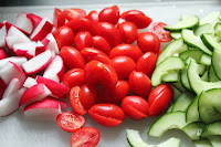 Radishes, tomatoes, and cucumbers