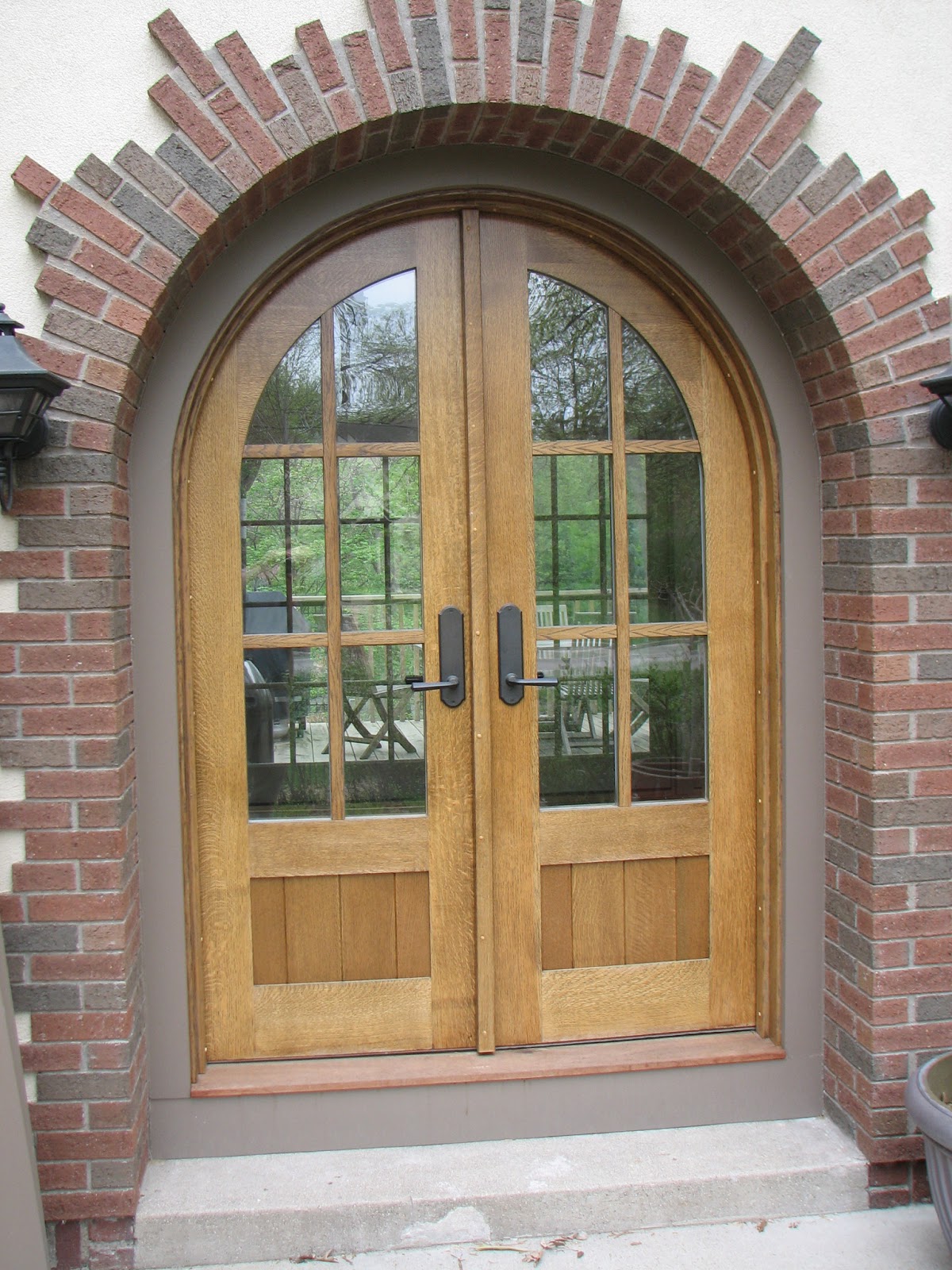 Custom made arched screen doors - woodcarving artwork woodworking craftsman